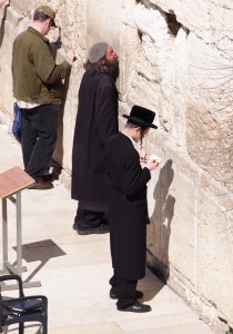 Men praying at the Western Wall