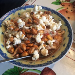 Dinner: Ceviche de Pollo topped with rice, popcorn and friend corn kernels