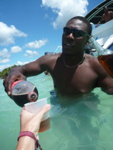 Drinking rum and coke in the Caribbean Sea